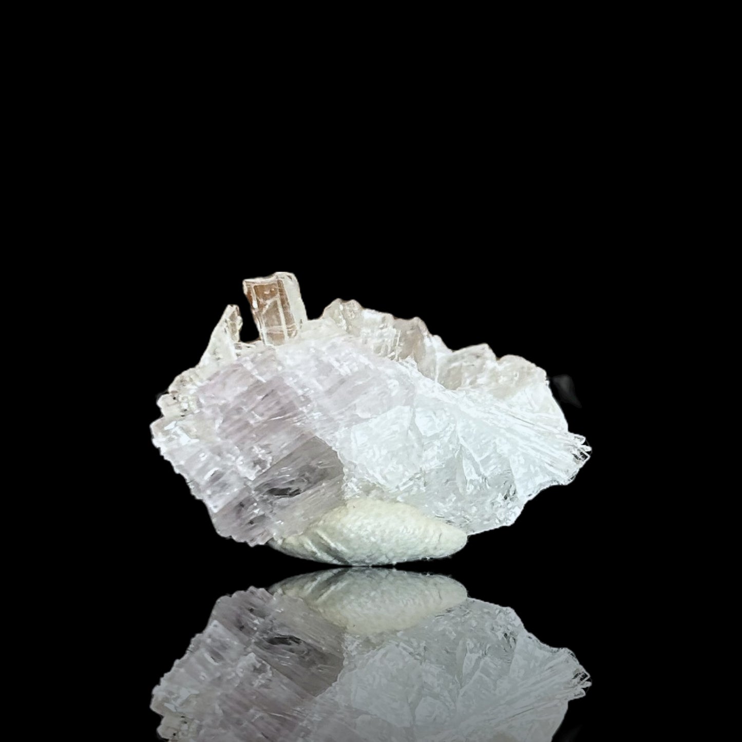 Hydroboracite on pink anhydrite - Kohnstein quarry, Germany